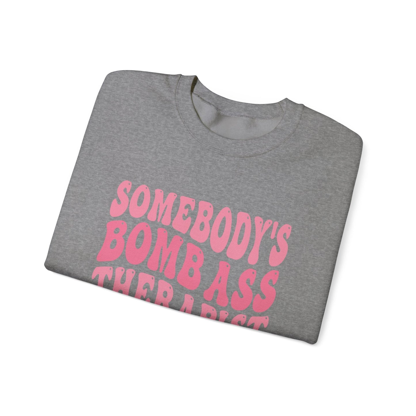 Somebody’s Bomb Ass Therapist (Pink) Crewneck Printify