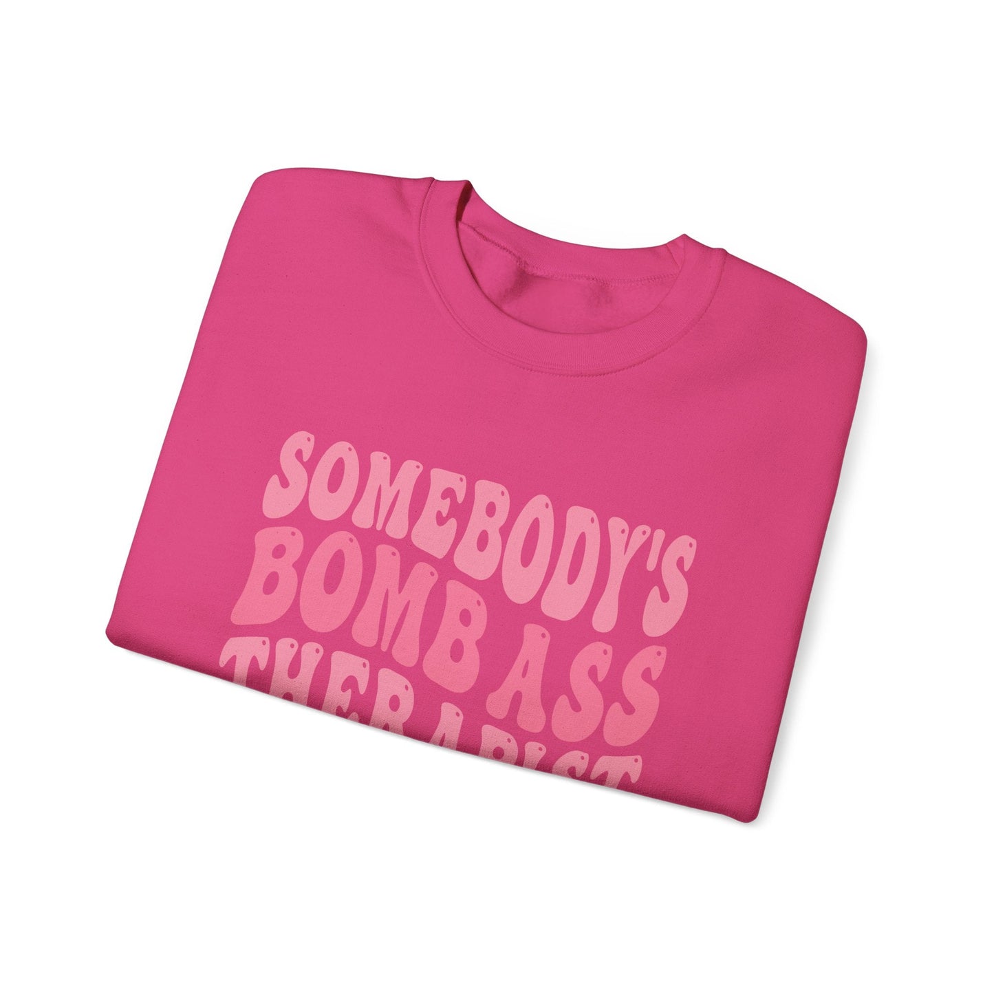 Somebody’s Bomb Ass Therapist (Pink) Crewneck Printify
