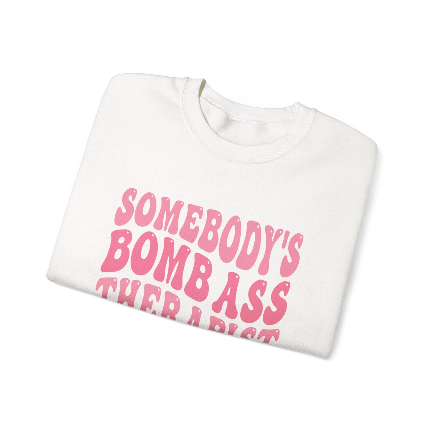 Somebody’s Bomb Ass Therapist (Pink) Crewneck Printify