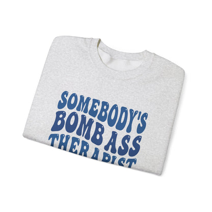 Somebody’s Bomb Ass Therapist (Blue) Crewneck Printify