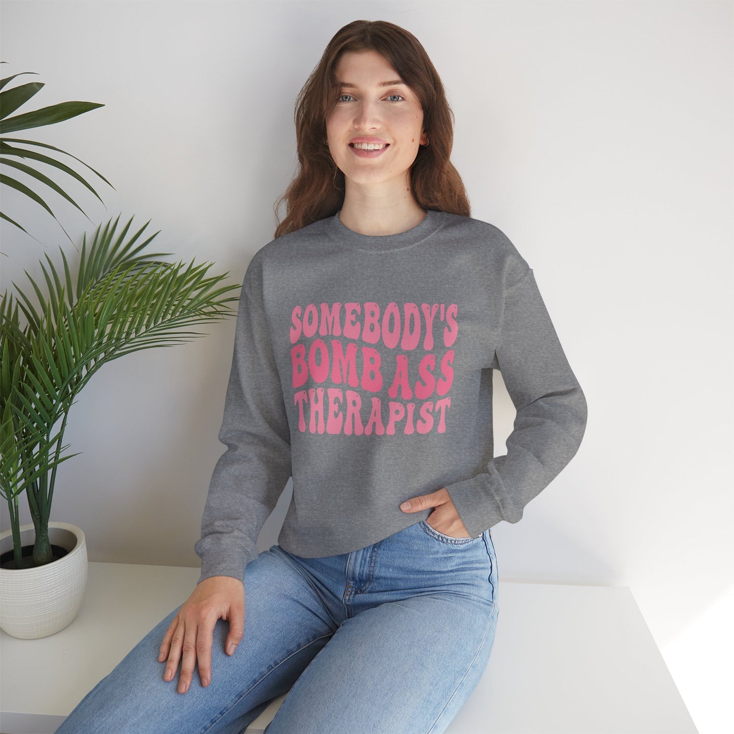 Somebody’s Bomb Ass Therapist (Pink) Crewneck