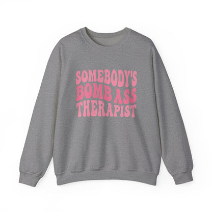 Somebody’s Bomb Ass Therapist (Pink) Crewneck