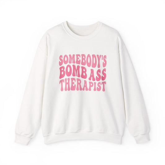 Somebody’s Bomb Ass Therapist (Pink) Crewneck Printify