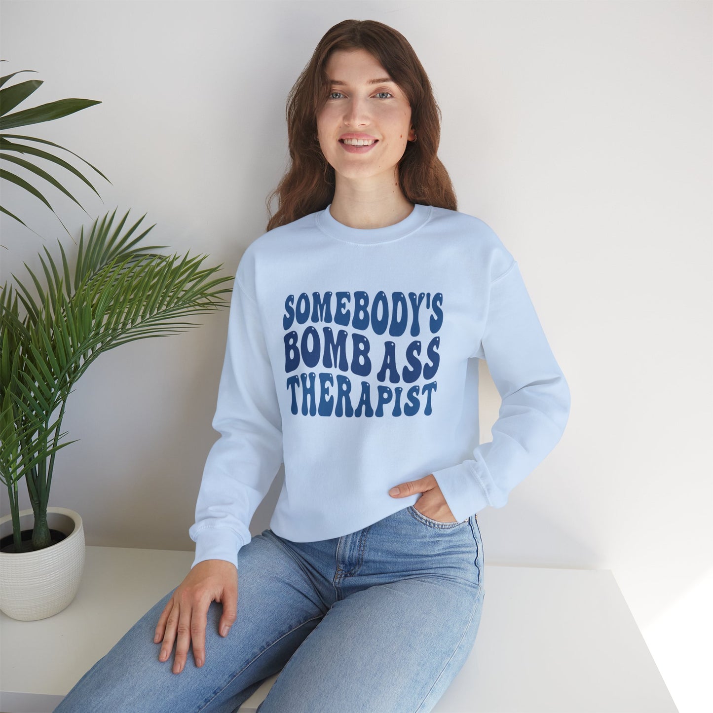 Somebody’s Bomb Ass Therapist (Blue) Crewneck