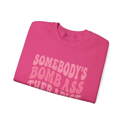 Somebody’s Bomb Ass Therapist (Pink) Crewneck Printify